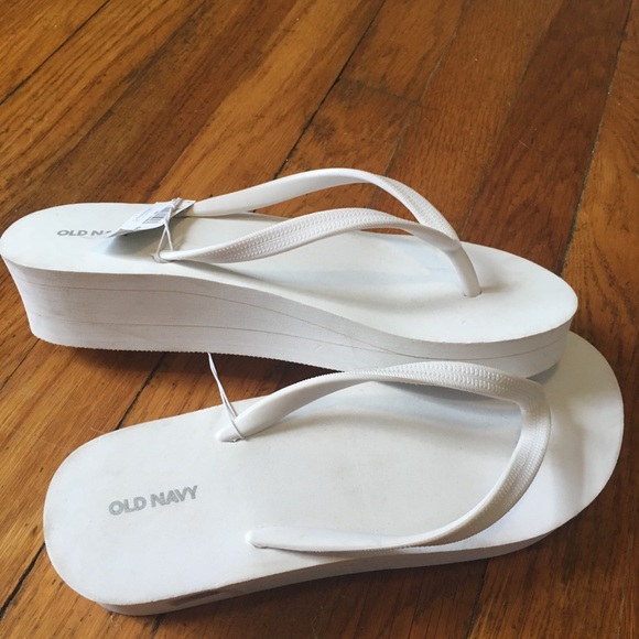 white heeled flip flops